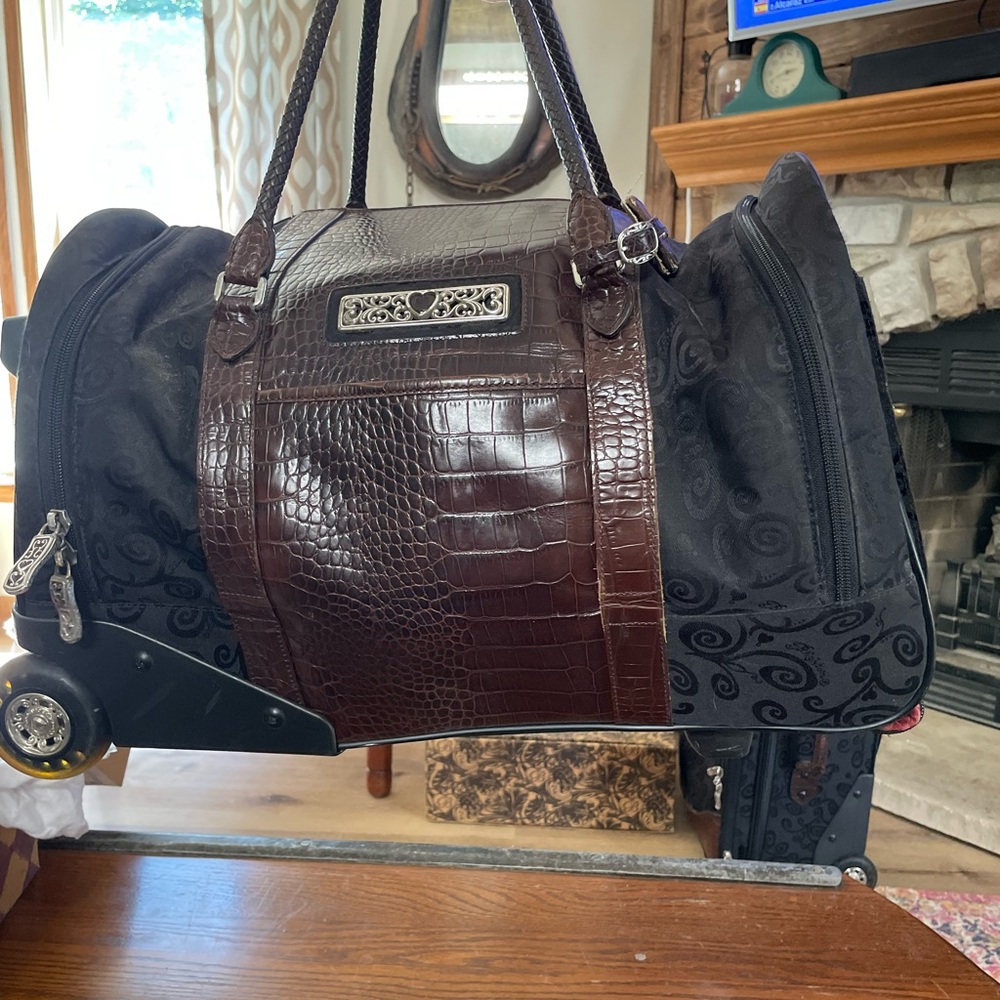 Brown and Black Rolling Duffel Bag